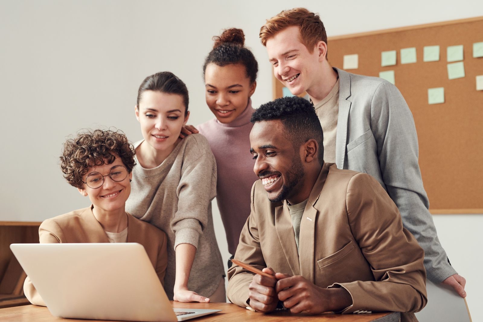 Business team discussing a technology project in a modern office